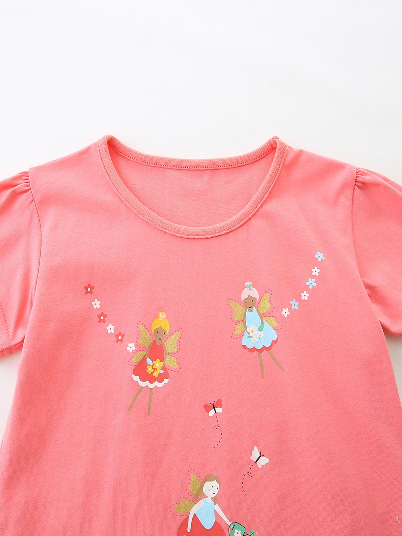 Coral cotton t-shirt with fairy graphics and puff sleeves
