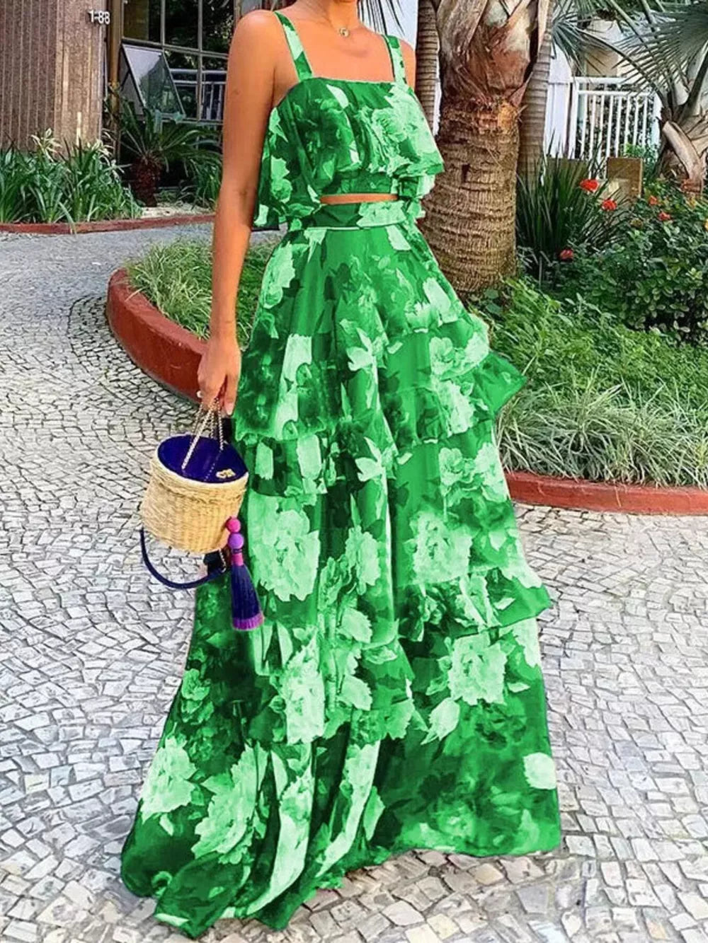 Green floral ruffled two-piece set with tiered maxi skirt and cropped cami top.