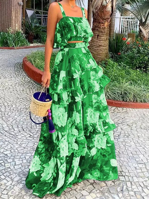 Green floral ruffled two-piece set with tiered maxi skirt and cropped cami top.