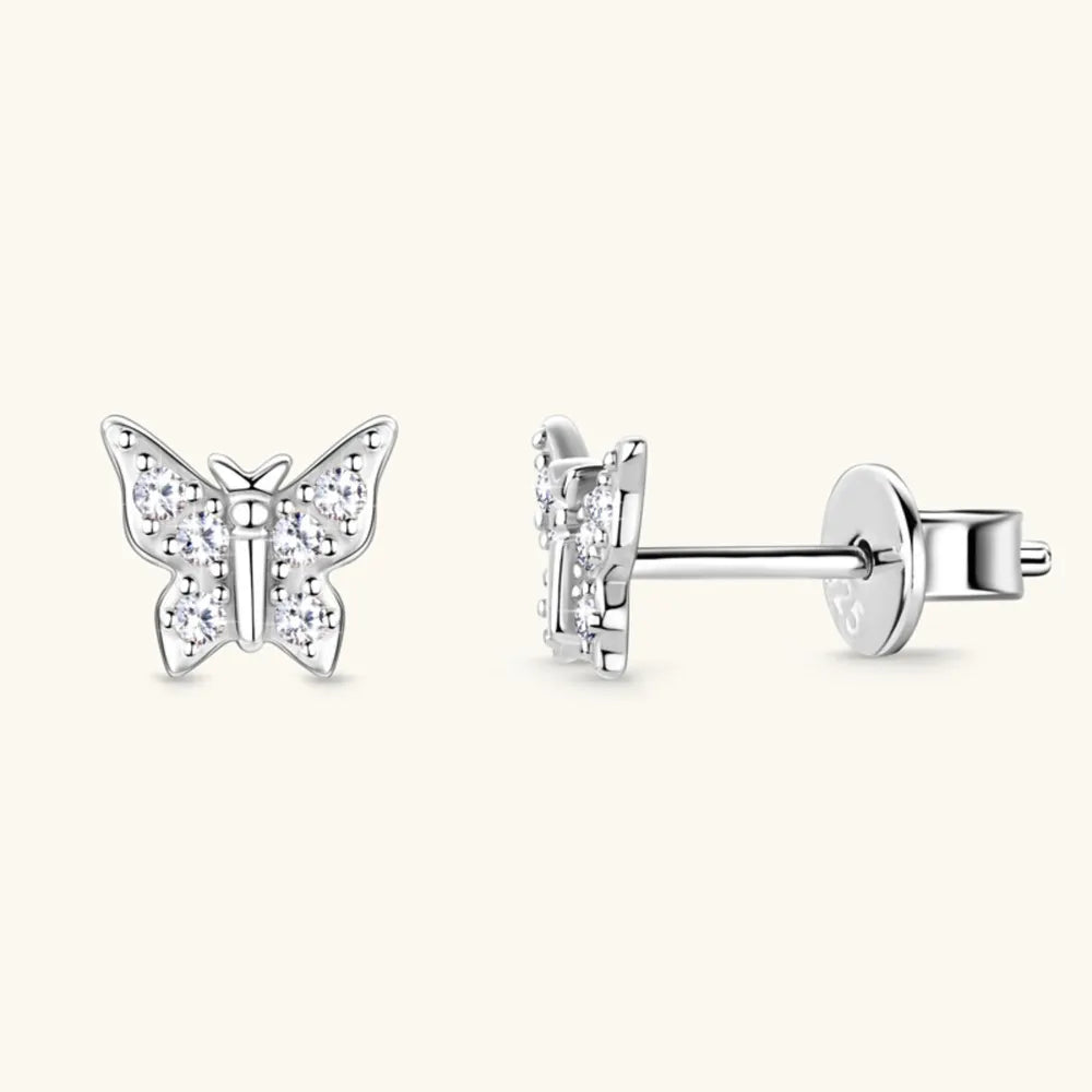 Silver moissanite butterfly stud earrings with clear stones.