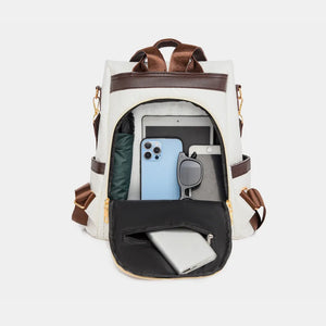 Woven faux leather convertible backpack in ivory with brown trim, showing interior organization with tablet, phone, and