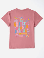 Dusty Pink t-shirt with colorful graphic text and affirmations on the back.
