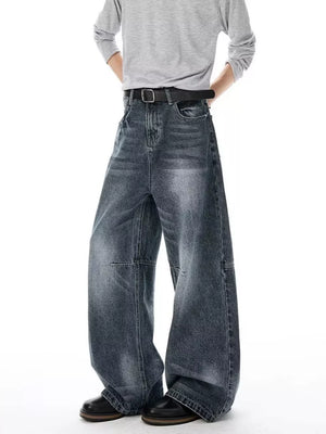 Men's dark wash wide-leg jeans with a belted waist and vintage wash.