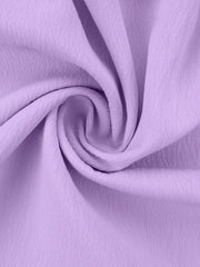 Pink Purple polyester pajama fabric with a ruffled texture detail.