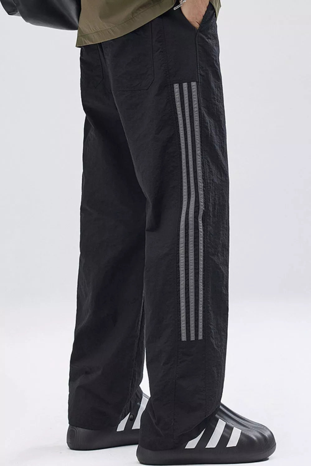 Black casual drawstring sweatpants with side stripes