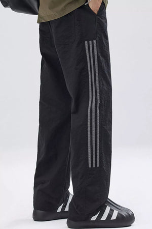 Black casual drawstring sweatpants with side stripes