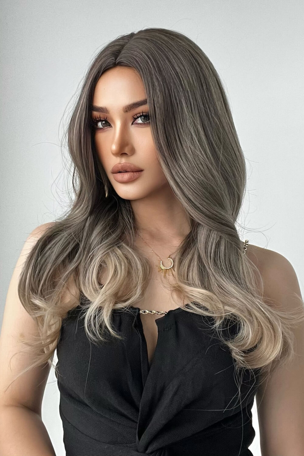 Ombre Wave Synthetic Wig in Ash Brown/Blonde Ombre, styled with loose waves.