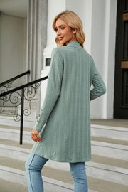 Sage textured knit open-front duster cardigan with button detail on sleeves.