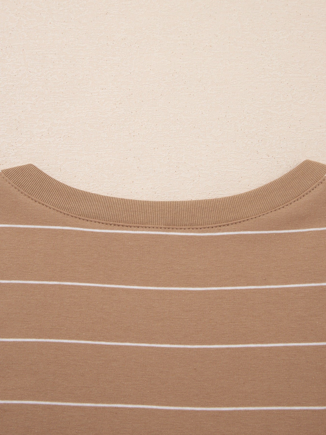 Brown striped t-shirt dress with crew neck and ribbed trim.