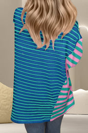 Asymmetric stripe panel tee in cerulean with pink and green stripes on the side.