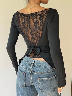 Black long sleeve tee with lace back detail and tie bow closure