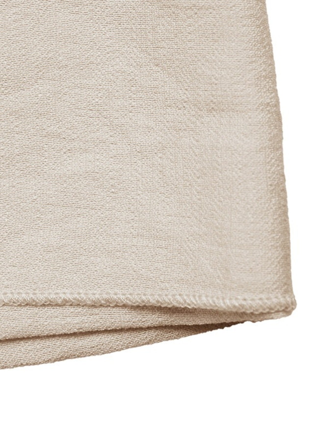 Beige linen blend mini skirt with asymmetrical hem and knotted buckle detail