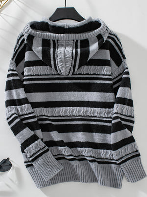 Textured stripe knit hoodie in dark gray and black with cable knit details on the hood and sleeves.