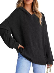 Black ribbed V-neck oversized hoodie sweatshirt with kangaroo pocket and balloon sleeves.