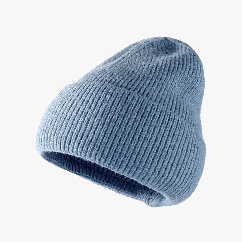 Ribbed knit slouch beanie in Light Blue with a relaxed fit.
