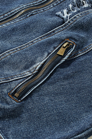 Dark blue denim jacket with distressed details and a zippered pocket.