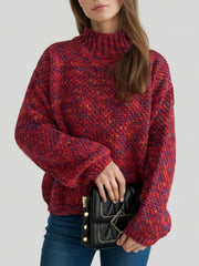 Textured mélange mock neck pullover sweater in deep red with a speckled pattern.