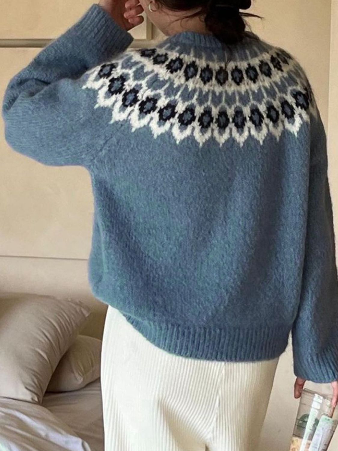 French blue acrylic sweater with a fair isle yoke pattern and round neck.