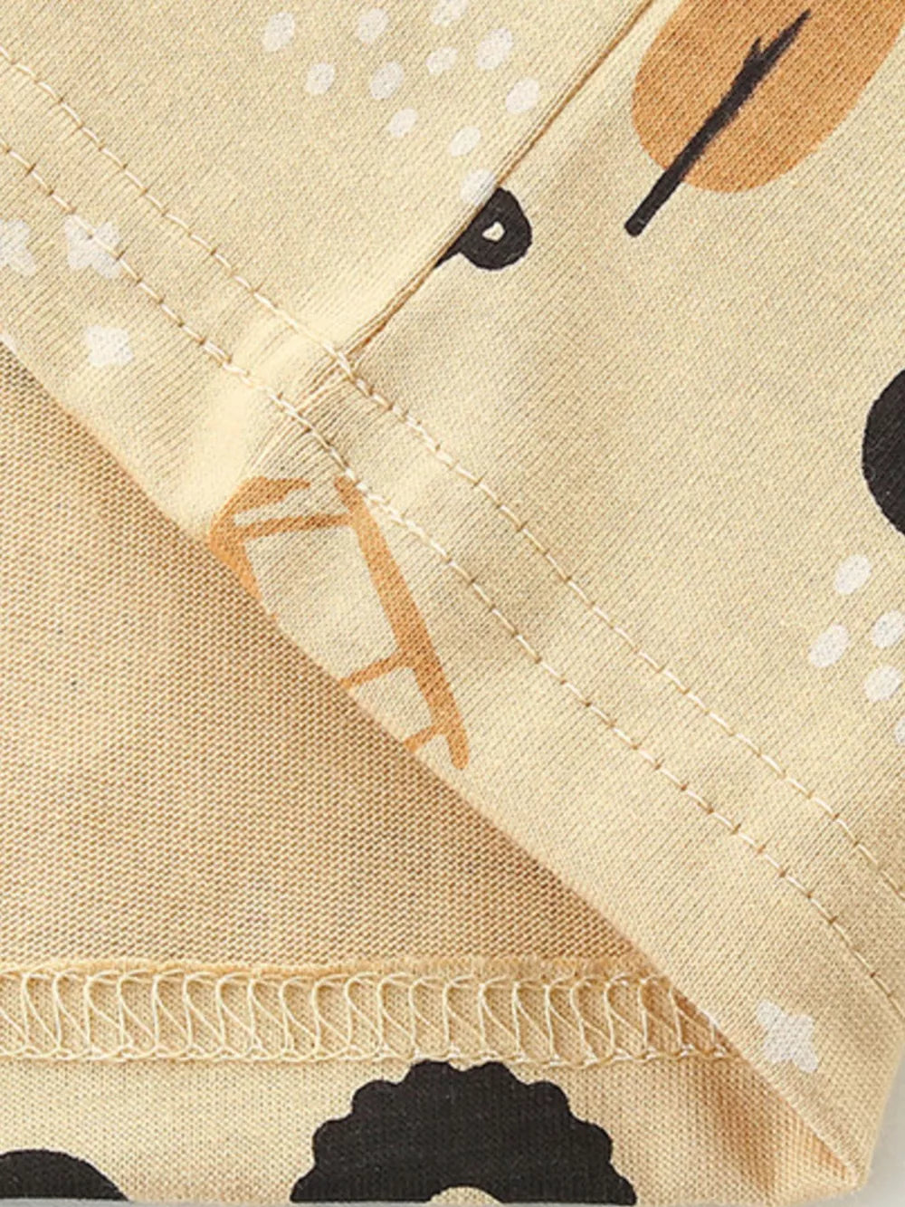 Toddler t-shirt in beige cotton with playful tractor and tree print.