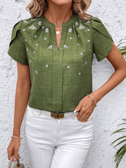 Matcha green embroidered floral keyhole blouse with short flutter sleeves.