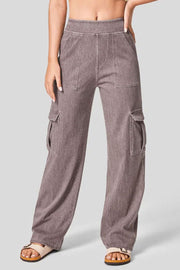 Utility denim wide-leg cargo pants in mocha with front and side pockets.