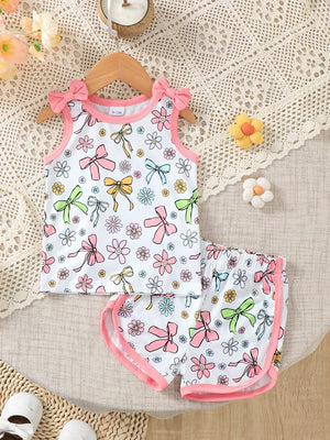 Toddler floral bowknot tank top and shorts set with pink trim and bow shoulder details.