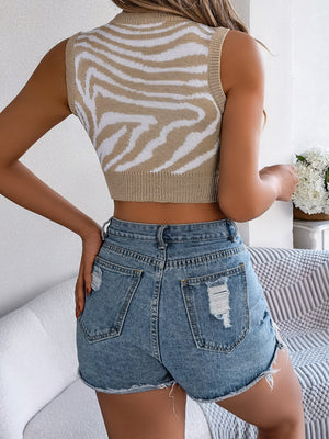Zebra knit crop top in tan and white with a keyhole neckline and sleeveless design.