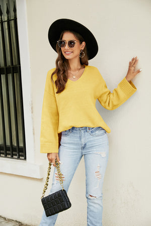 Yellow relaxed fit v-neck knit pullover sweater with ribbed cuffs and hem
