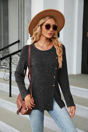Black ribbed tunic top with button detail and asymmetric hem