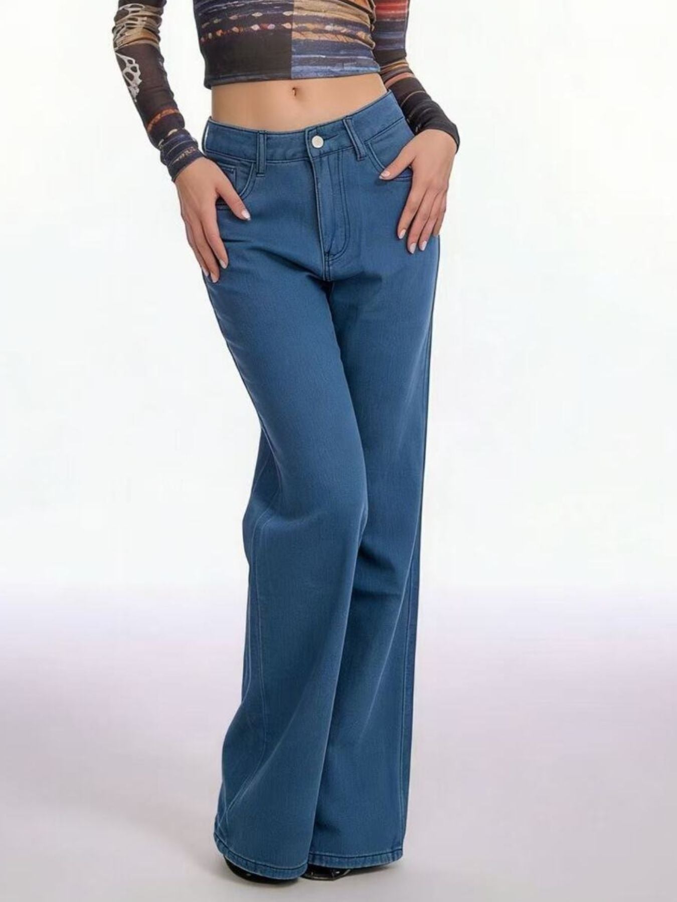 Light blue high-waisted wide-leg jeans with a classic fit and cotton blend material.