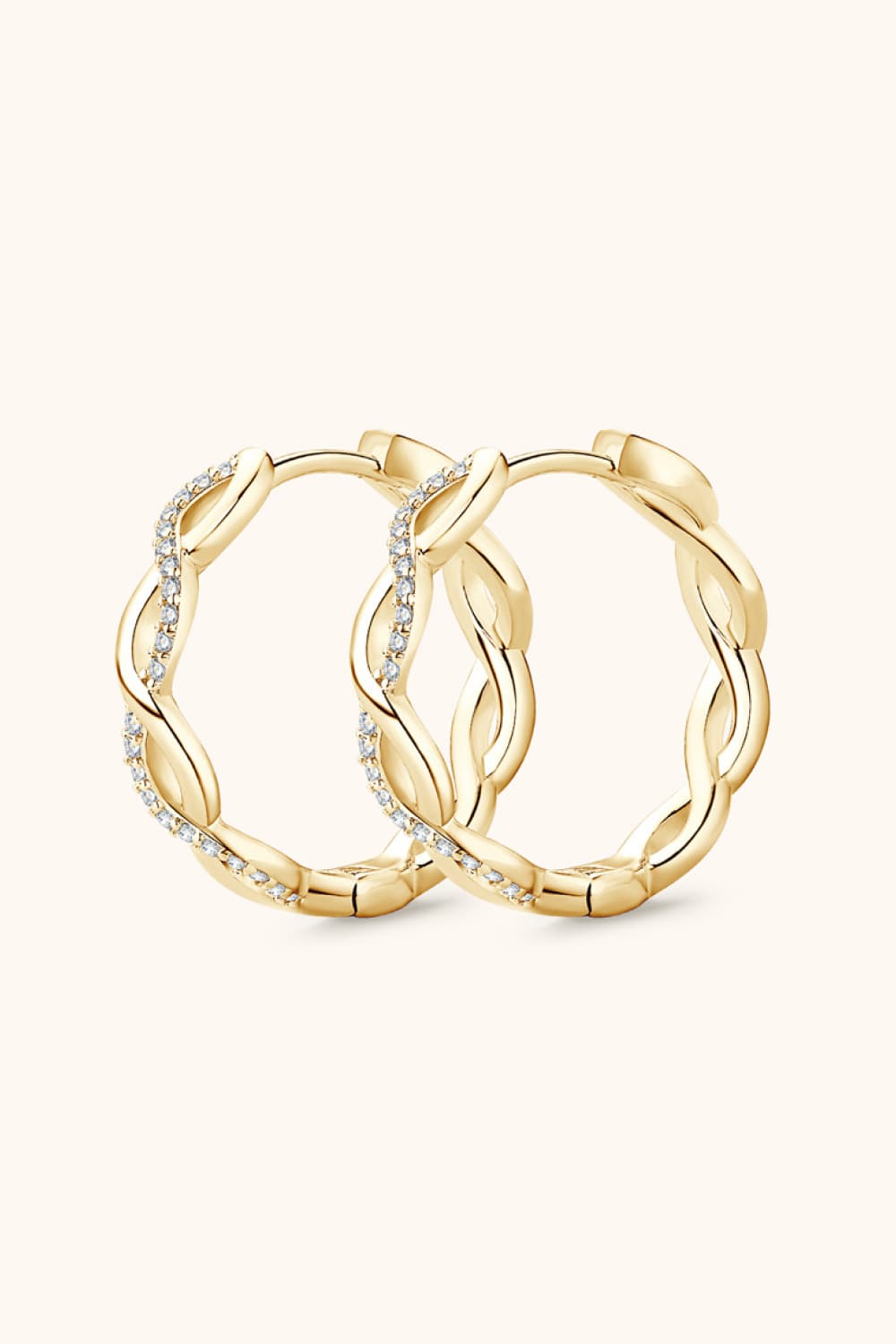Gold braided pavé hoop earrings with cubic zirconia detail