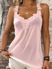 Blush pink lace trimmed halter cami with V-neck and floral detail.