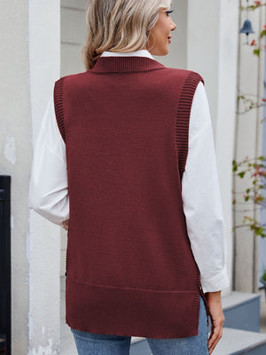Burgundy ribbed knit vest with side buttons, collared neckline, and a relaxed fit.