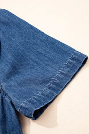 Blue denim collared mini shift dress with short sleeves and visible stitching detail.