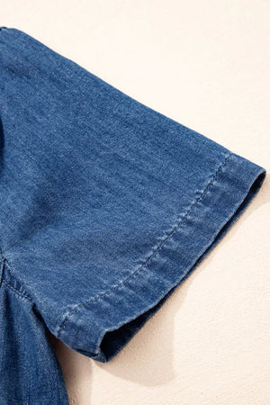 Blue denim collared mini shift dress with short sleeves and visible stitching detail.