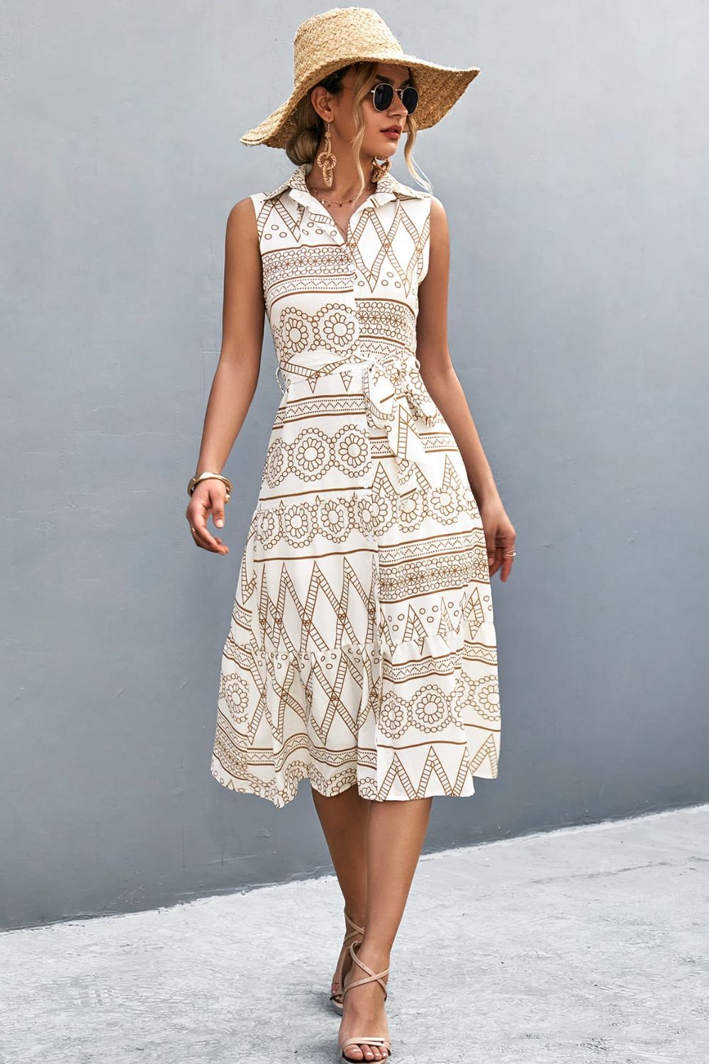 White sleeveless midi dress with geometric print and tie waist