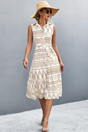 White sleeveless midi dress with geometric print and tie waist