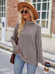 Ribbed turtleneck sweater in Khaki with side slits, long sleeves and relaxed fit.