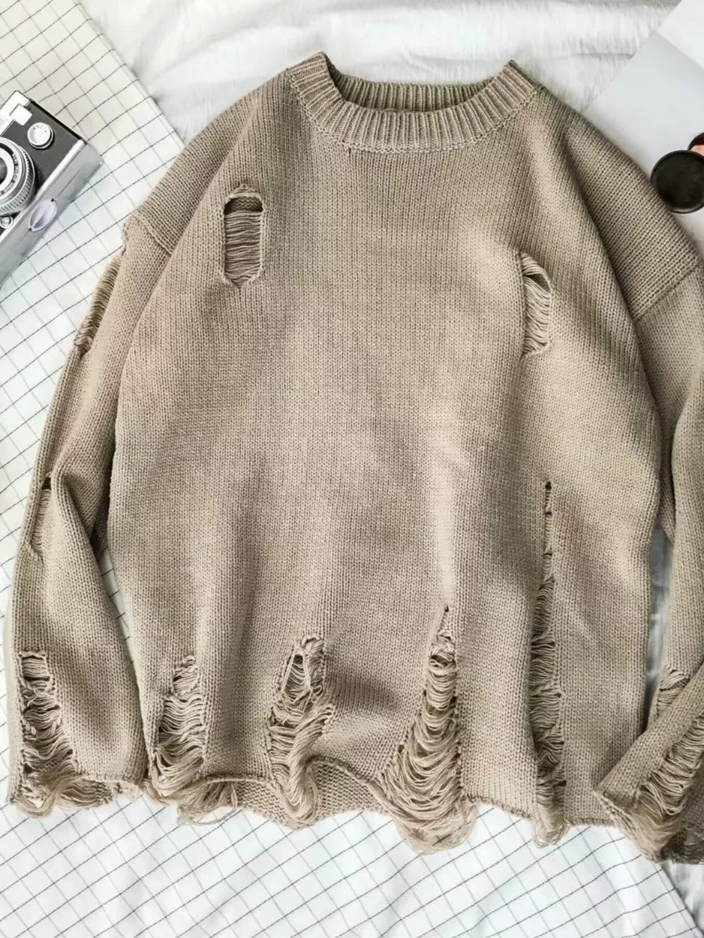 Men's Distressed Round Neck Sweater in Black, close-up detail