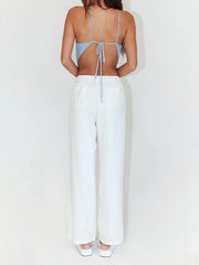 Light blue crochet halterneck triangle top with back tie detail.