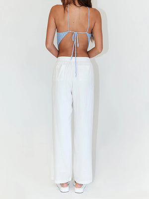 Light blue crochet halterneck triangle top with back tie detail.