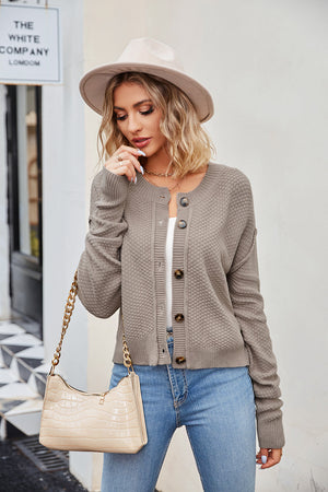 Textured knit cropped cardigan in mocha with button front and crew neck.