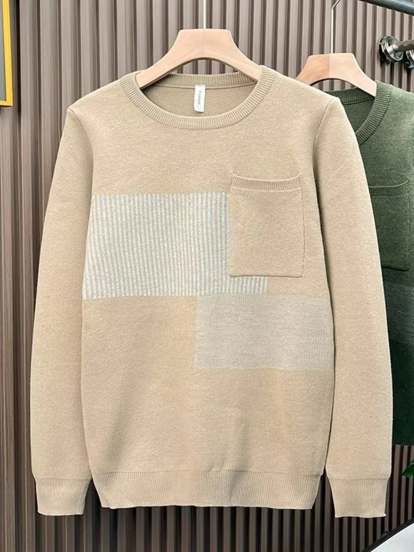 Men's Khaki striped pocket sweater with crew neck and long sleeves.