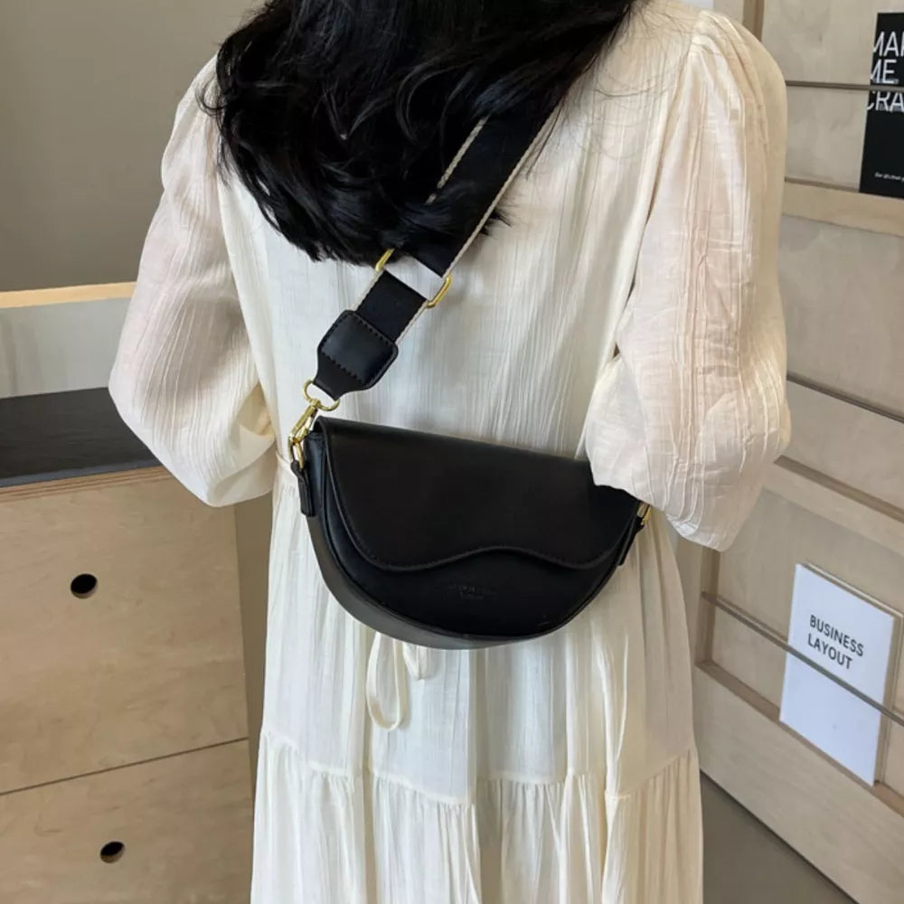 Leather Crescent Crossbody Bag in Black, side view