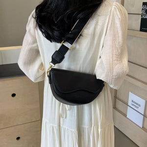 Leather Crescent Crossbody Bag in Black, side view
