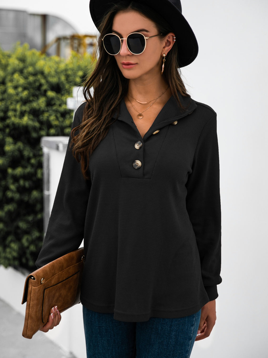 Black long sleeve waffle knit tee with button collar detail