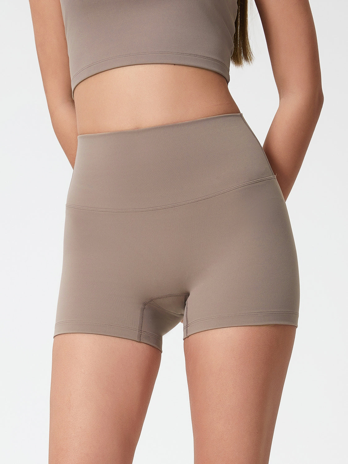 Nova Rise High-Motion Shorts in Mocha, a seamless activewear style with a high waist.