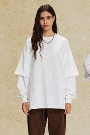 White oversized long sleeve tee with layered sleeves and crewneck.