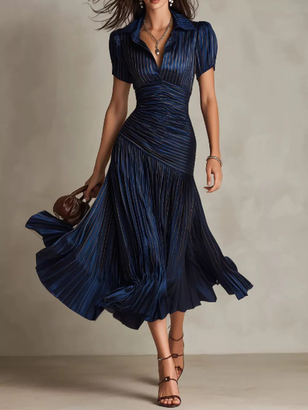 Navy ruched midi dress with pleated skirt and striped detail
