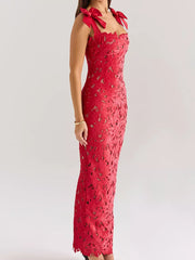 Red floral lace maxi dress with tie shoulder bows and cutout detail.